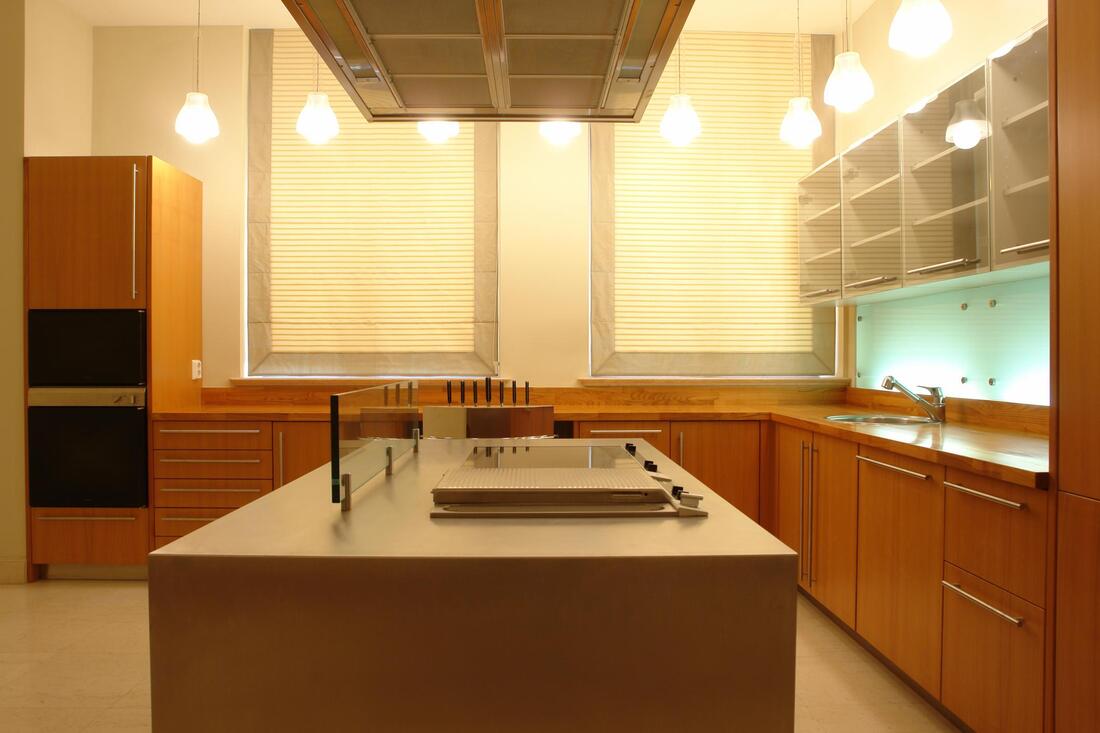 kitchen with counter top and ceiling lamps